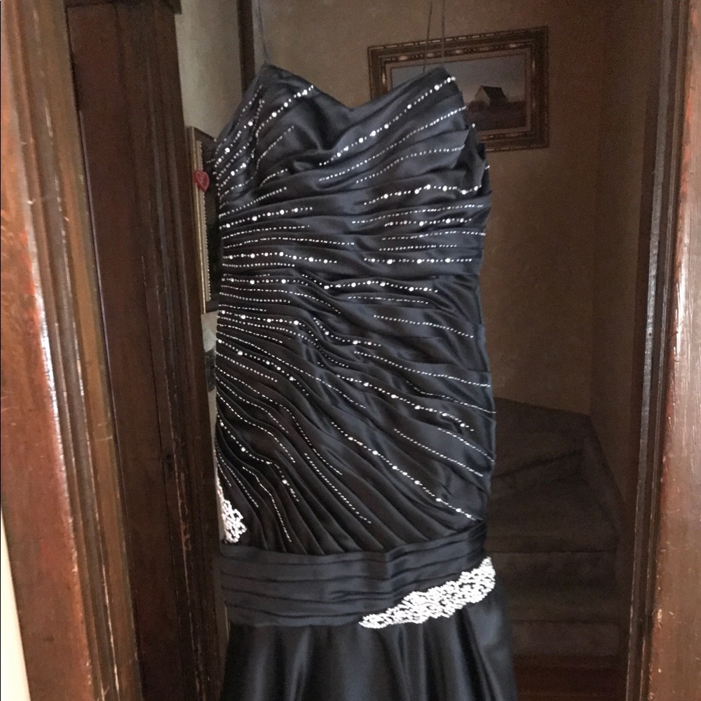Black strapless gown with belaro jacket. One once!